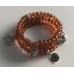 Spiraal armband BOEDDHA met BRUINE glaskralen 